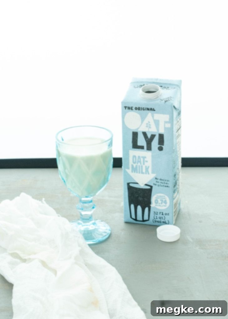 are oat milks safe for Celiacs photo of oatly in a glass