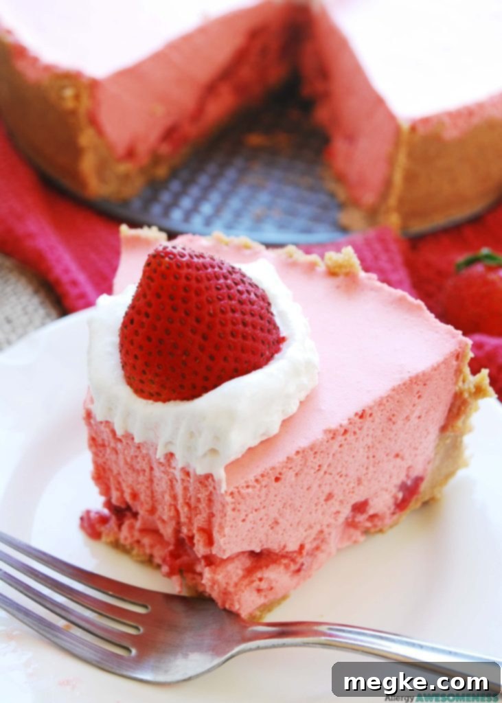 Worry-Free No-Bake Strawberry Jello Treat 2 Allergy-friendly No Bake Strawberry Jello Pie slice with fresh strawberries and a cinnamon cookie crust