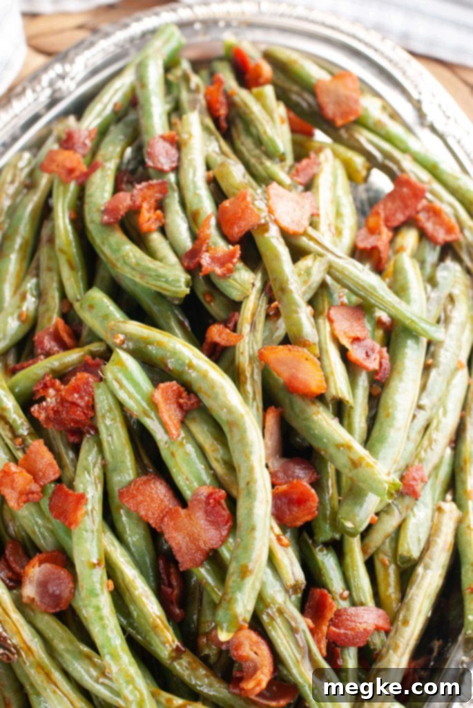Step-by-step guide on how to make oven roasted bacon green beans for Thanksgiving