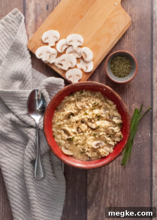 Close-up of fluffy Instant Pot Mushroom Rice Pilaf in a serving bowl