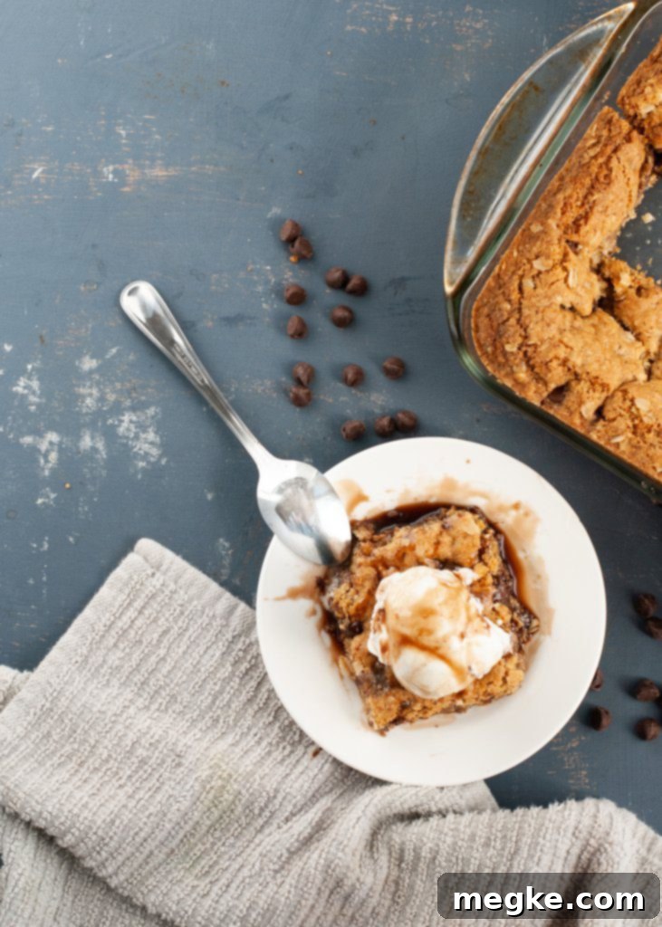 Indulgent Gluten Free Vegan Oatmeal Chocolate Chip Bars 4 how-to-make-oatmeal-chocolate-chip-cookie-bars-gluten-free with ice cream on top