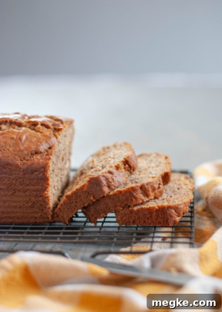 Perfect Gluten Free Banana Bread Visual Recipe 2 Deliciously moist gluten-free banana bread loaf, sliced and ready to eat.