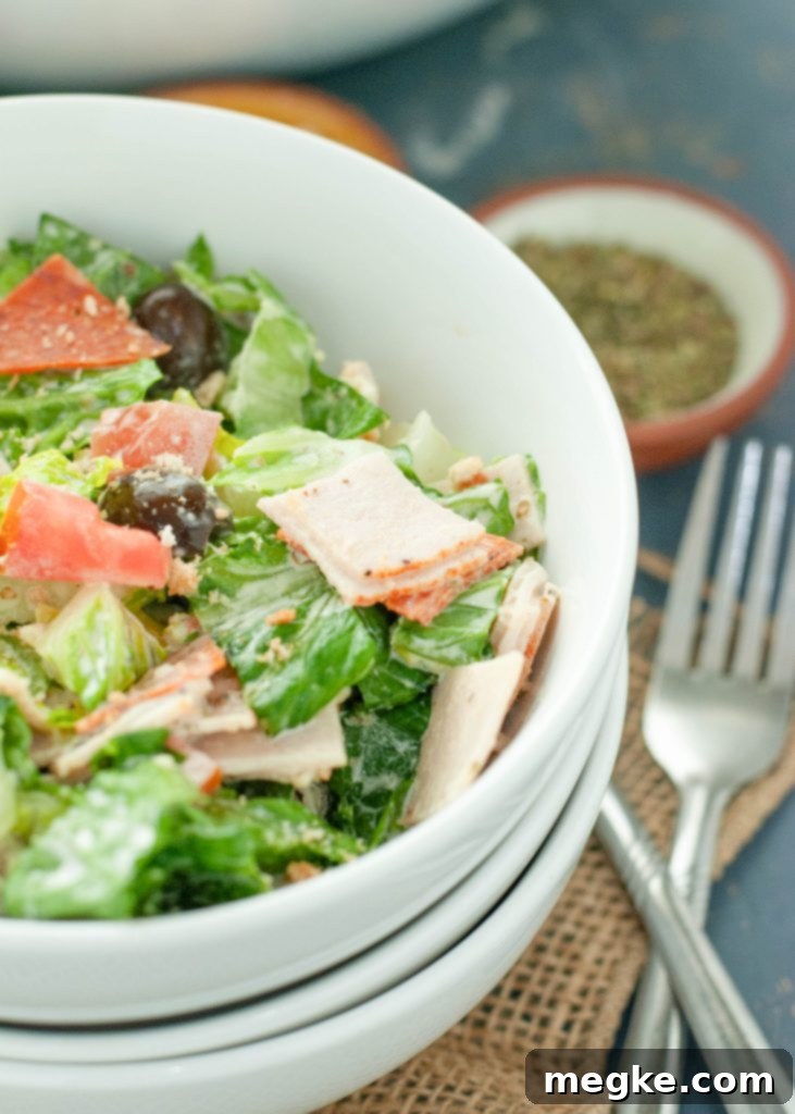 italian chopped salad close up in a white bowl