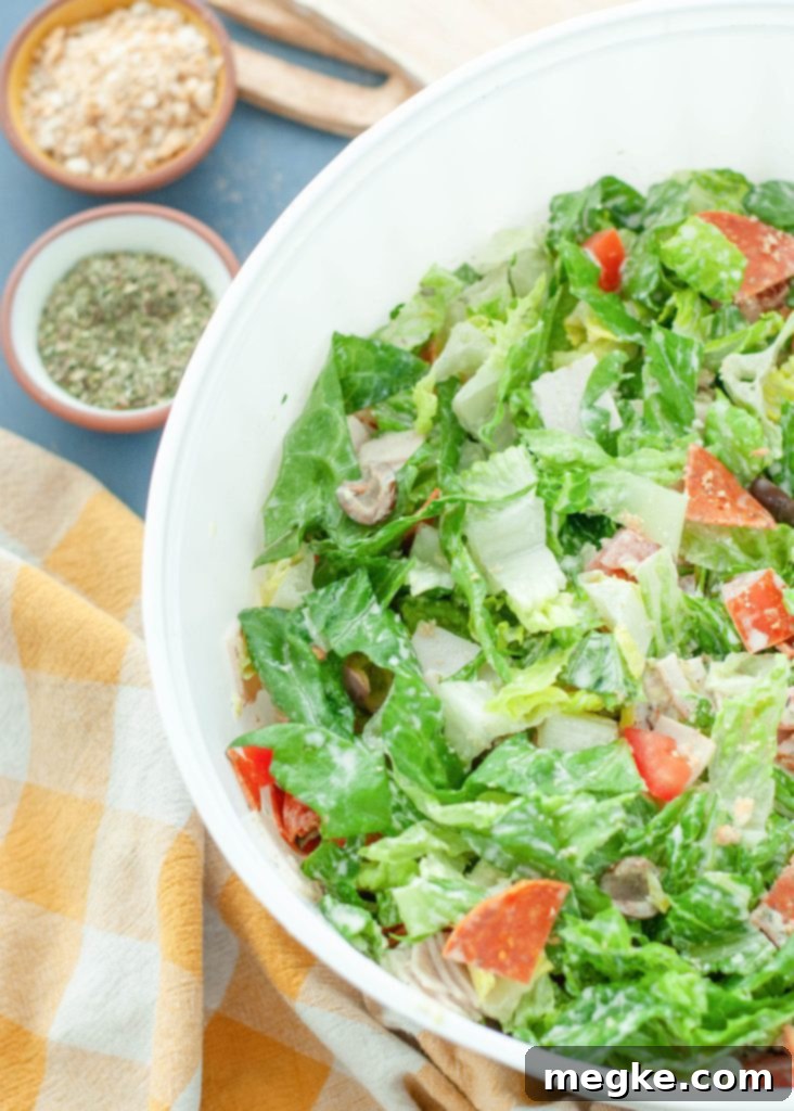 creamy-italian-green-salad-in-large-white-serving-bowl