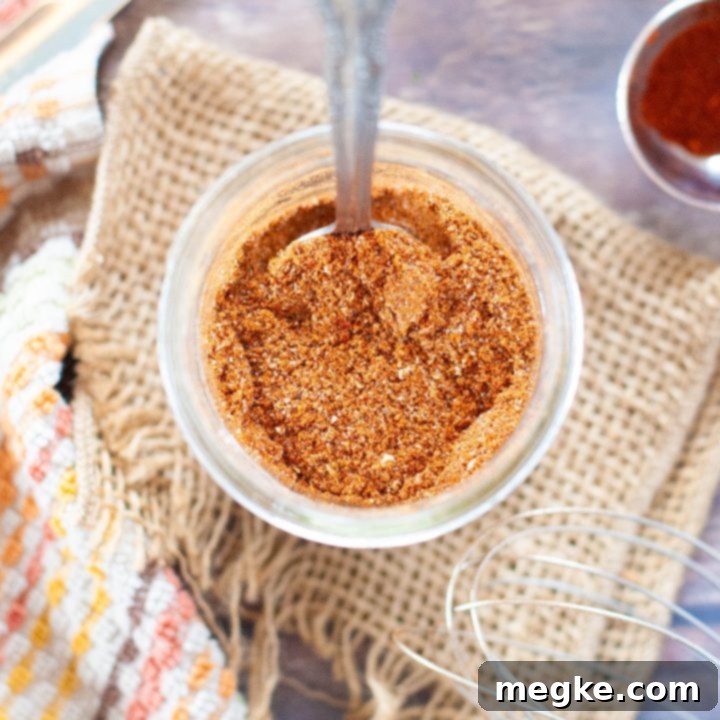 DIY Gluten-Free Taco Spice Mix 7 Homemade gluten-free taco seasoning spices in a jar from an overhead perspective