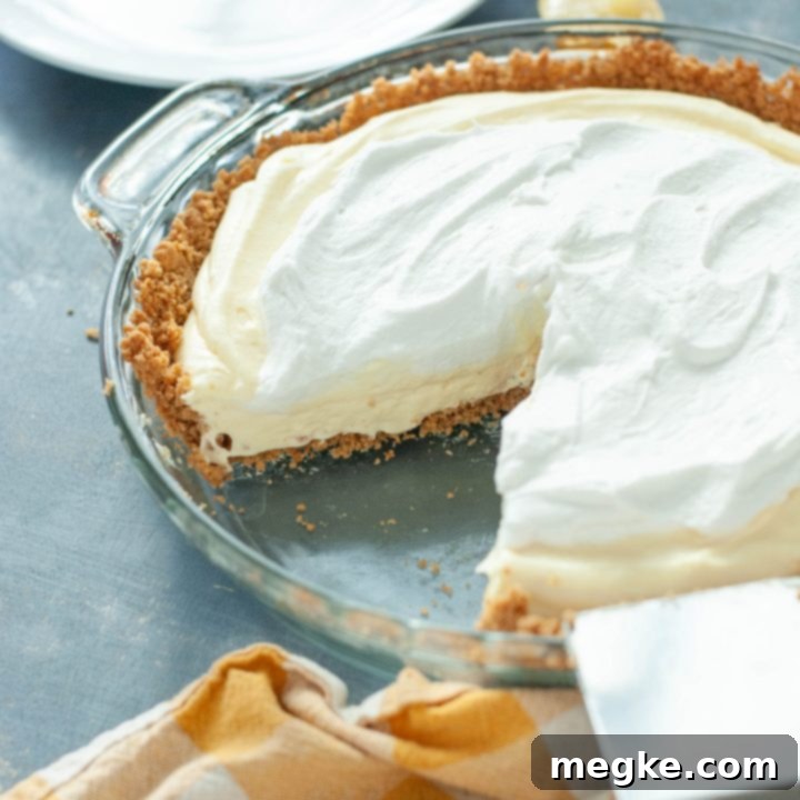 Delicious Gluten-Free Dairy-Free Lemon Cream Pie 7 gluten-free-dairy-free-lemon-cream-pie with slice taken out